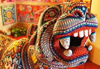 Featured is a photo of a Huichol Indian beaded art masterpiece ... a beaded jaguar found in Puerto Vallerta, Mexico.